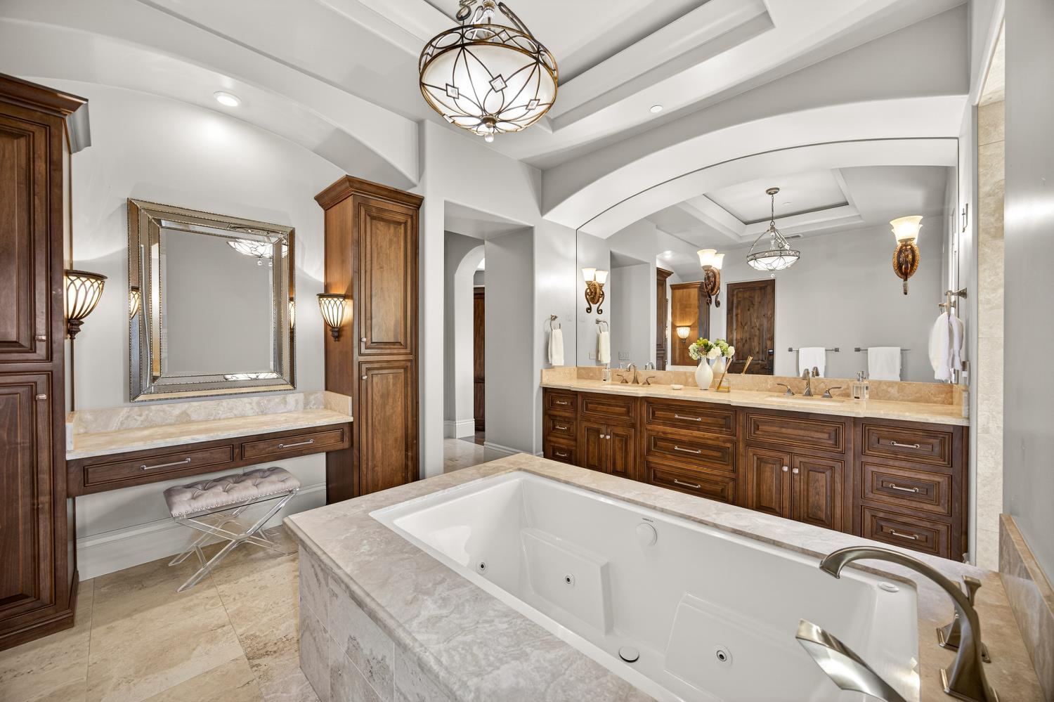 3909 Edgevale Court Fair Oaks, CA 95628 - Photo 44 of 98 a large bathroom with a sink a large mirror and a shower
