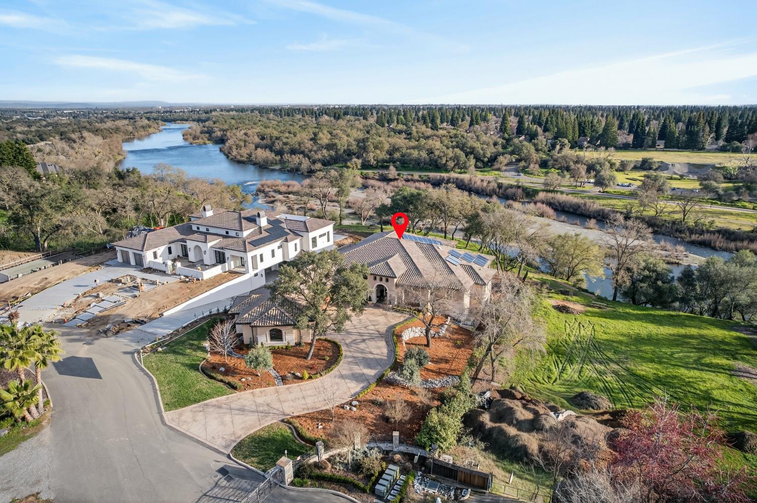 3909 Edgevale Court Fair Oaks, CA 95628 - Photo 90 of 98 an aerial view of a house with a garden and lake view