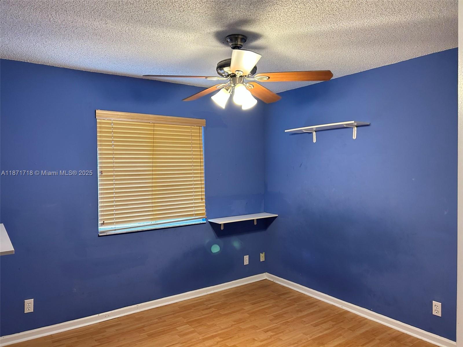 15851 Southwest 10th Street, Unit 15851 Pembroke Pines, FL 33027 - Photo 11 of 17 a view of a room with a fan and a window