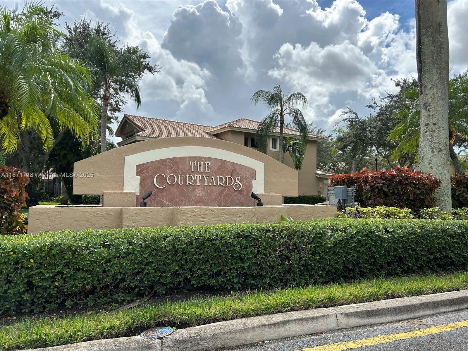 15851 Southwest 10th Street, Unit 15851 Pembroke Pines, FL 33027 - Photo 17 of 17 a view of a sign in front of a building