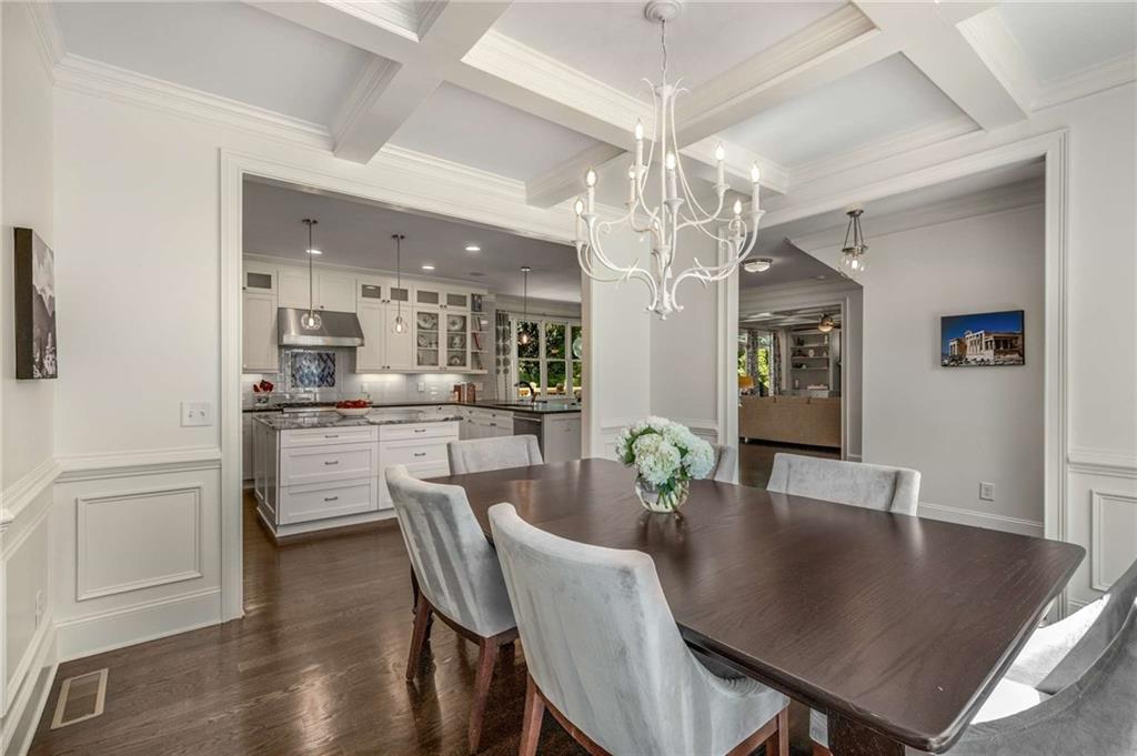 2456 Sunset Drive Northeast Atlanta, GA 30345 - Photo 11 of 49 a view of a dining room with furniture and wooden floor