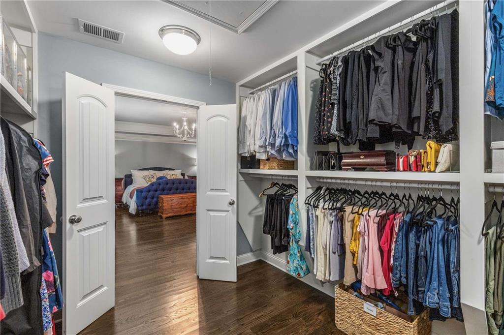 2456 Sunset Drive Northeast Atlanta, GA 30345 - Photo 27 of 49 a view of walk in closet with clothes and shoes
