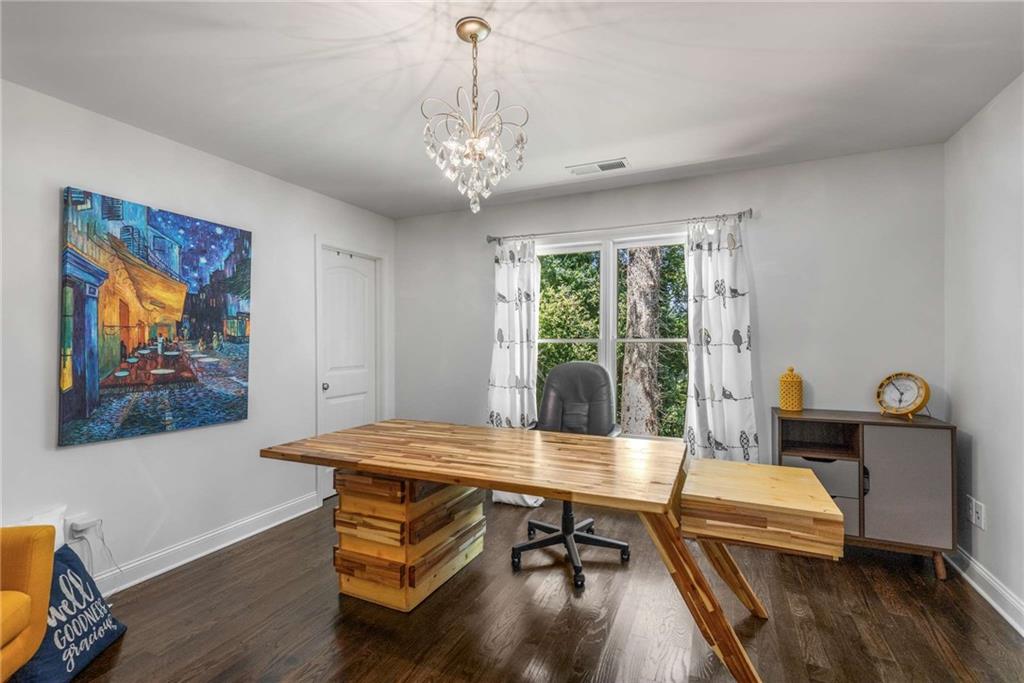 2456 Sunset Drive Northeast Atlanta, GA 30345 - Photo 35 of 49 a reading room with furniture wooden floor and window