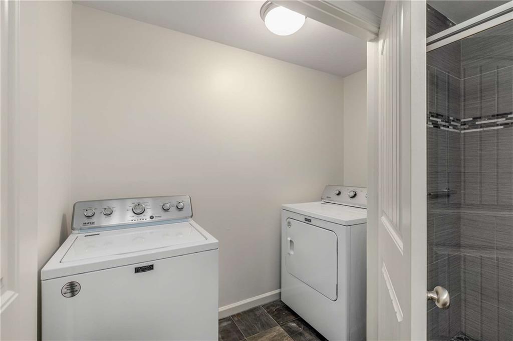 2456 Sunset Drive Northeast Atlanta, GA 30345 - Photo 41 of 49 a utility room with dryer and washer