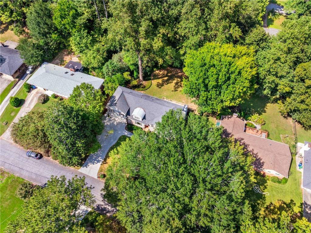 2456 Sunset Drive Northeast Atlanta, GA 30345 - Photo 49 of 49 an aerial view of a house with a yard