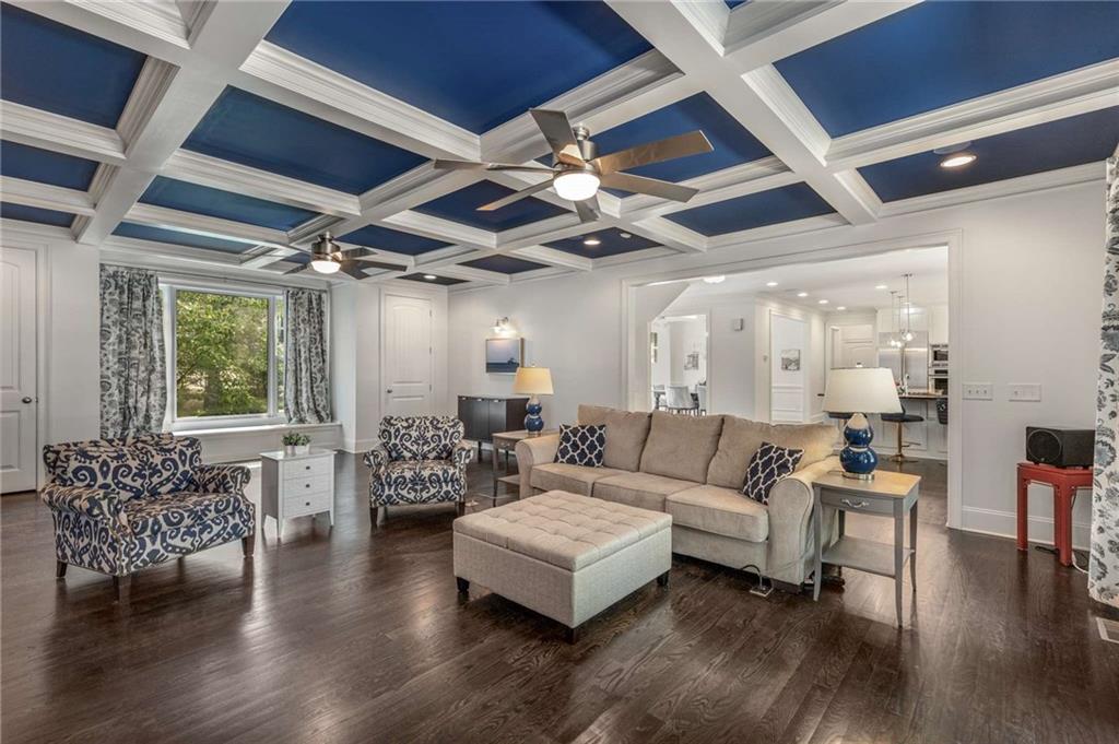 2456 Sunset Drive Northeast Atlanta, GA 30345 - Photo 5 of 49 a living room with furniture and wooden floor