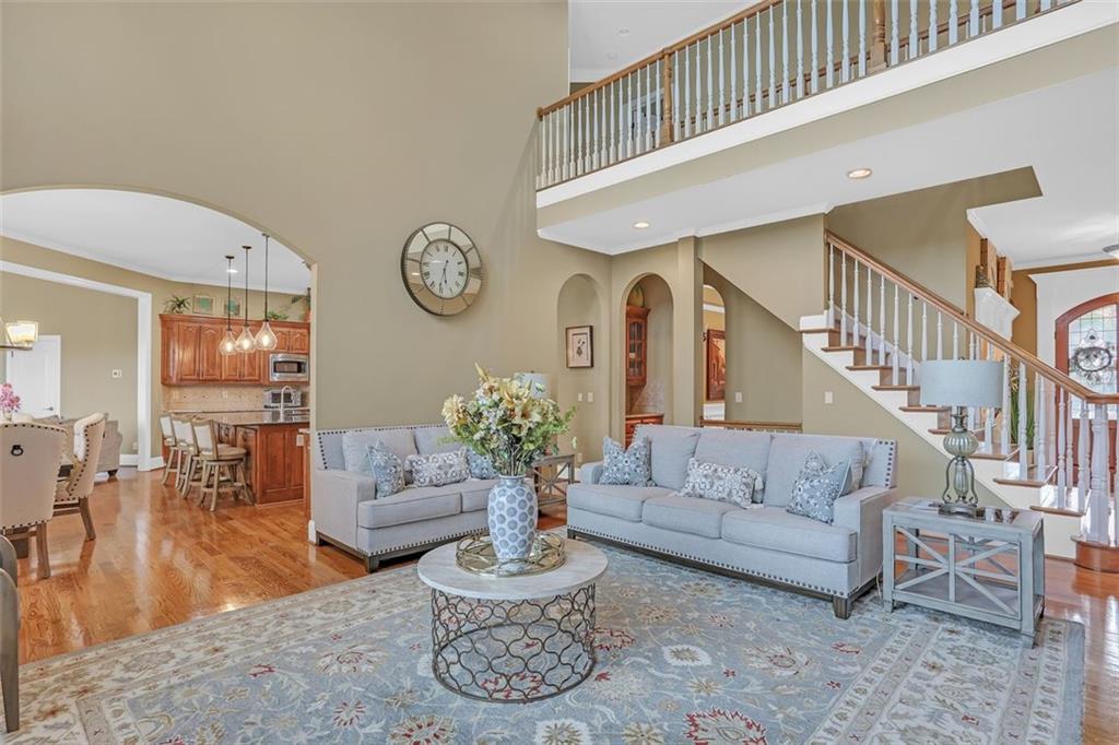 1385 Harris Road Lawrenceville, GA 30043 - Photo 18 of 76 a living room with furniture and a large window