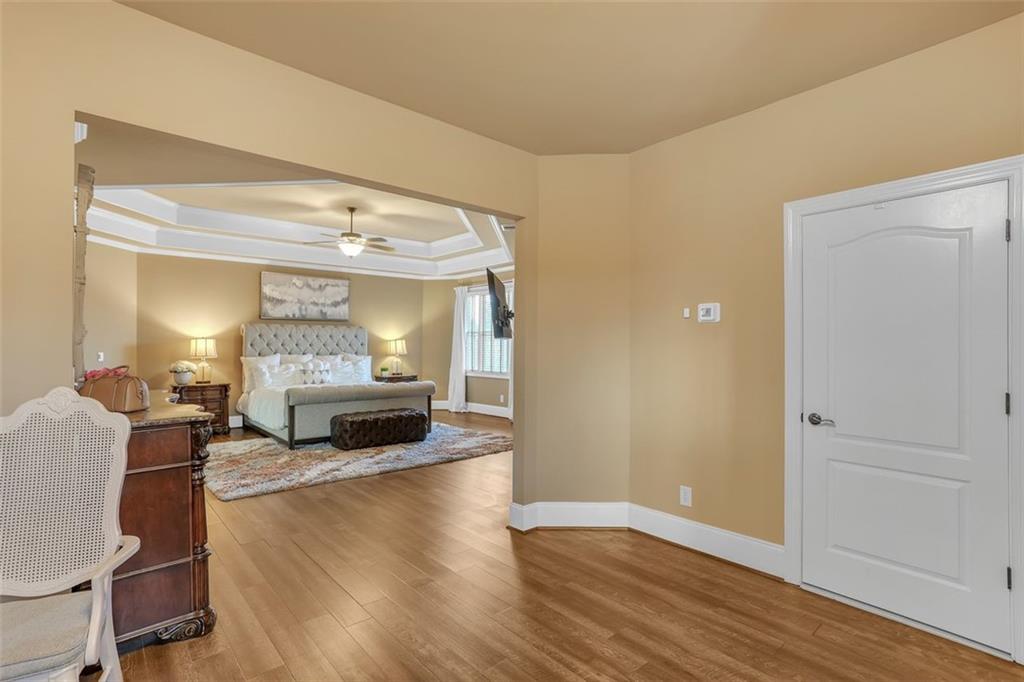 1385 Harris Road Lawrenceville, GA 30043 - Photo 43 of 76 a living room with furniture and a fireplace