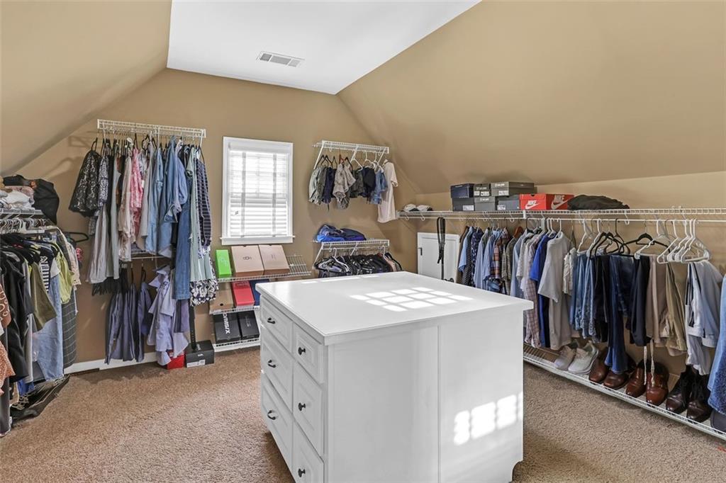 1385 Harris Road Lawrenceville, GA 30043 - Photo 49 of 76 a utility room with dryer and washer