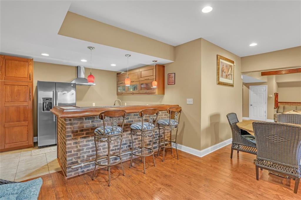 1385 Harris Road Lawrenceville, GA 30043 - Photo 58 of 76 a view of a dining room with furniture
