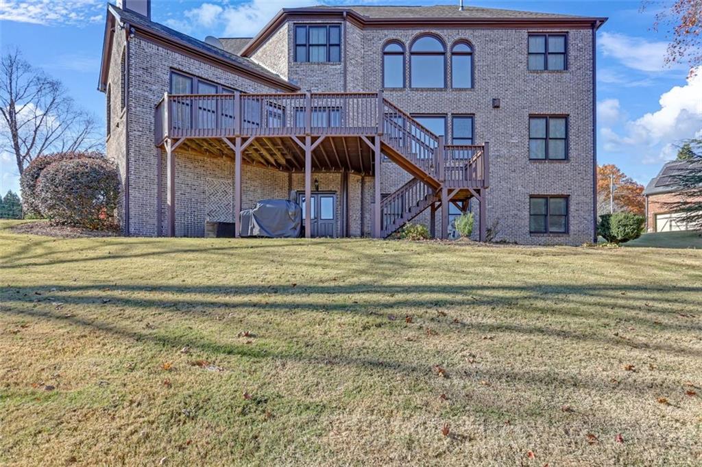 1385 Harris Road Lawrenceville, GA 30043 - Photo 65 of 76 a view of a house with a outdoor space