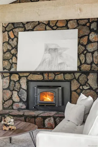 a living room with a fireplace