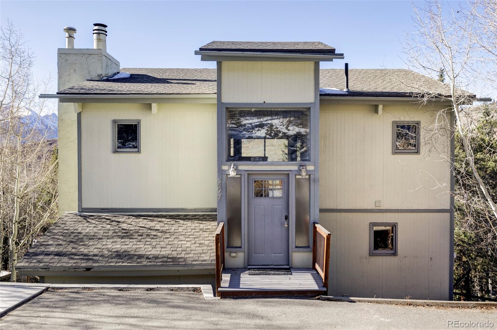 297 Deer Path Road Dillon, CO 80435 - Photo 3 of 49 a front view of a house with shower