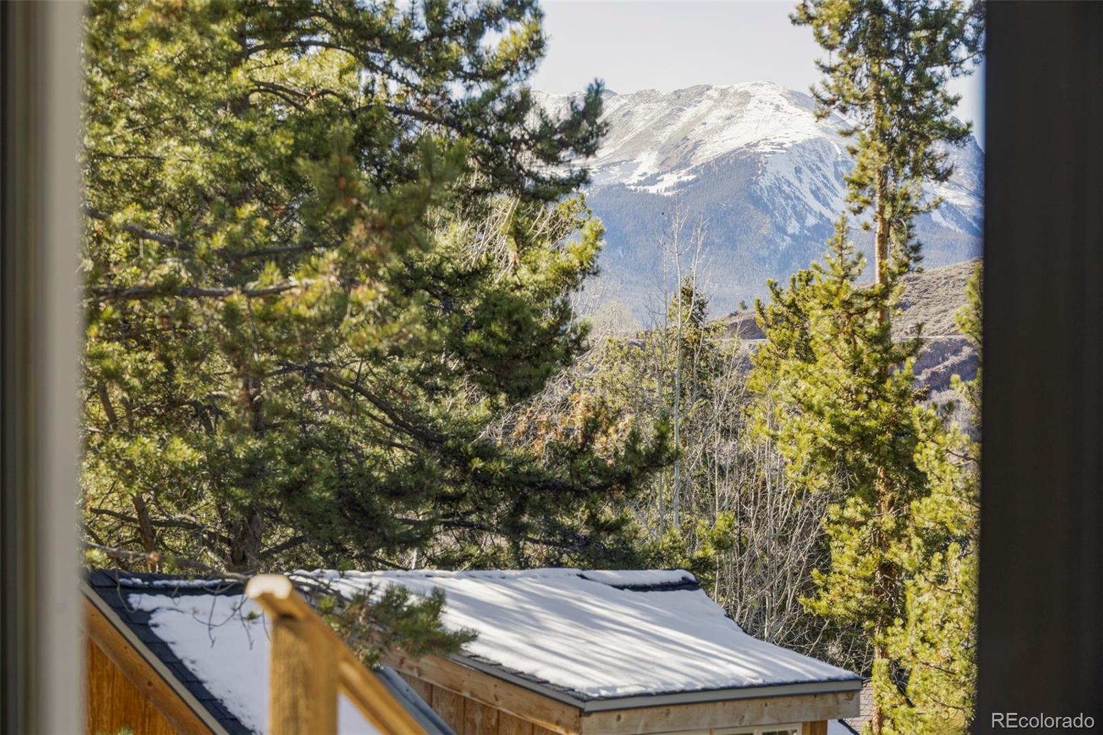 297 Deer Path Road Dillon, CO 80435 - Photo 34 of 49 a view of a house with a yard
