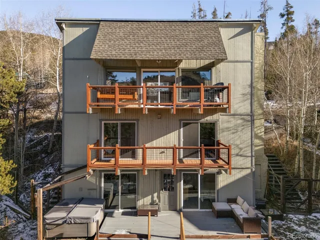 a view of a balcony with wooden floor