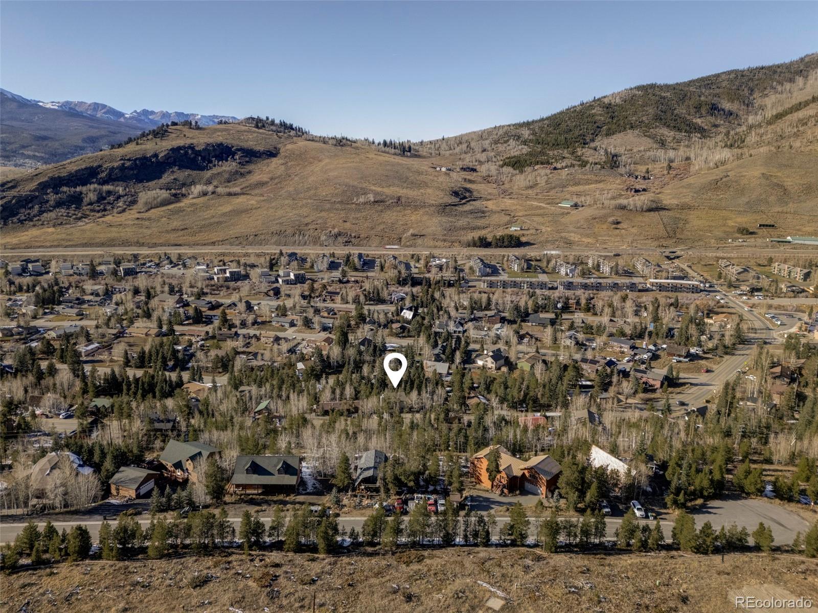 297 Deer Path Road Dillon, CO 80435 - Photo 46 of 49 an aerial view of residential house and sandy dunes