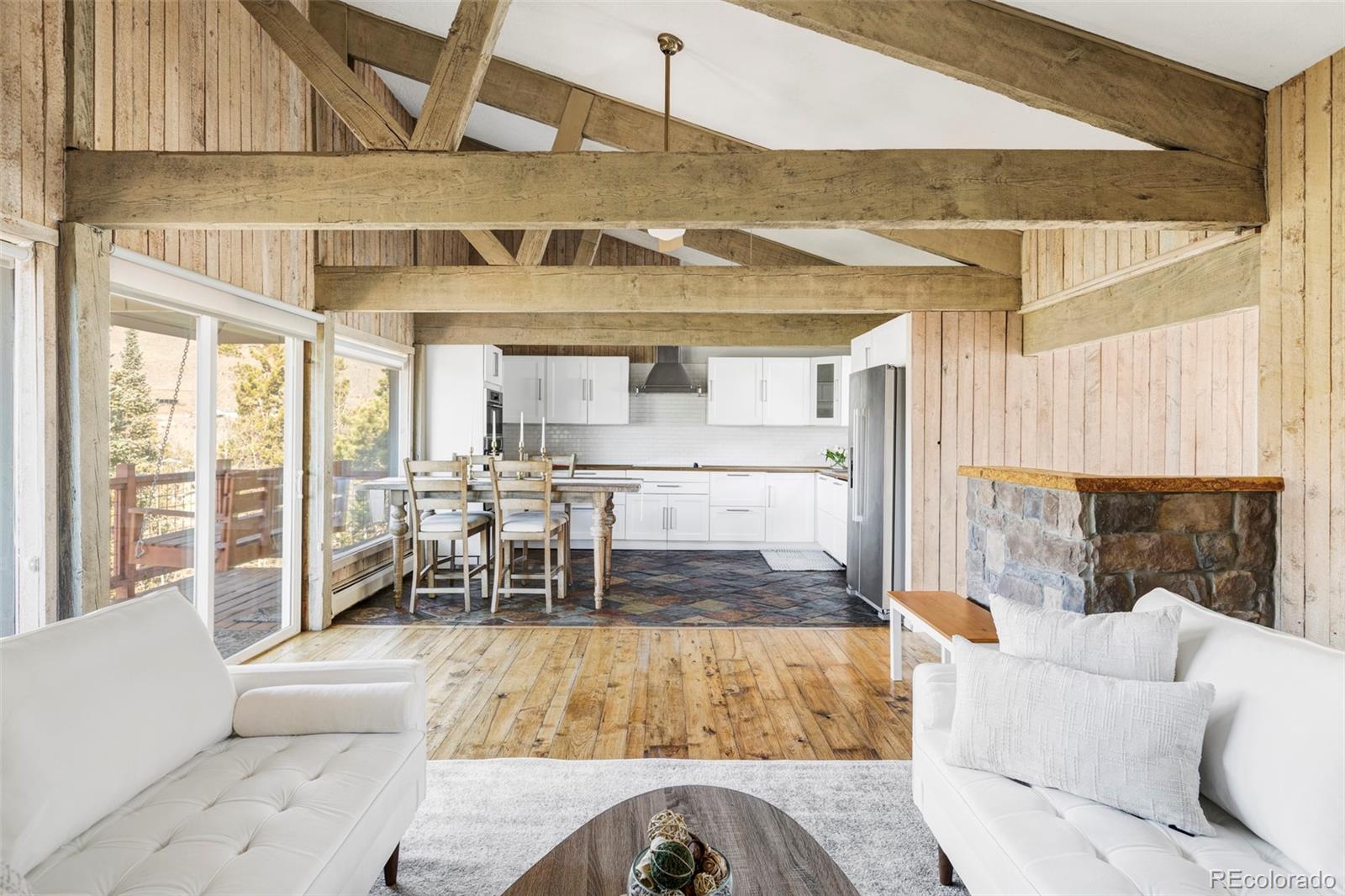 297 Deer Path Road Dillon, CO 80435 - Photo 6 of 49 a living room with furniture and a table