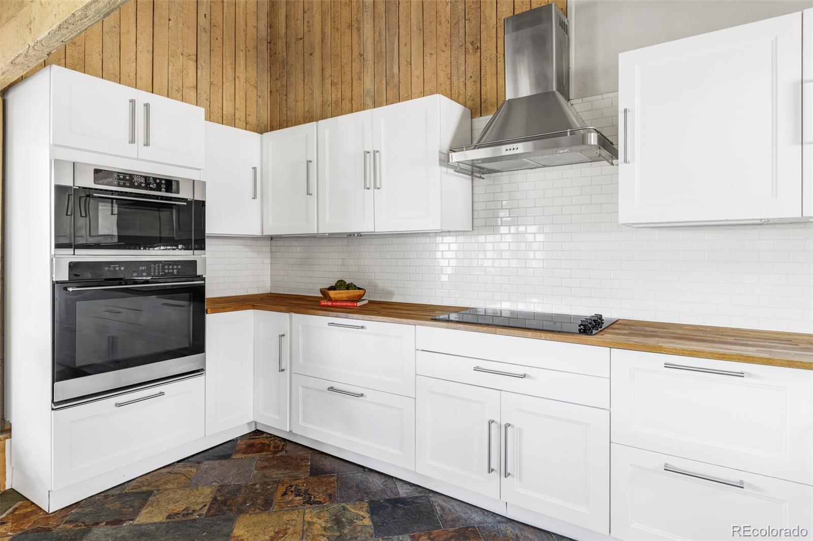 297 Deer Path Road Dillon, CO 80435 - Photo 10 of 49 a kitchen with cabinets appliances and a sink