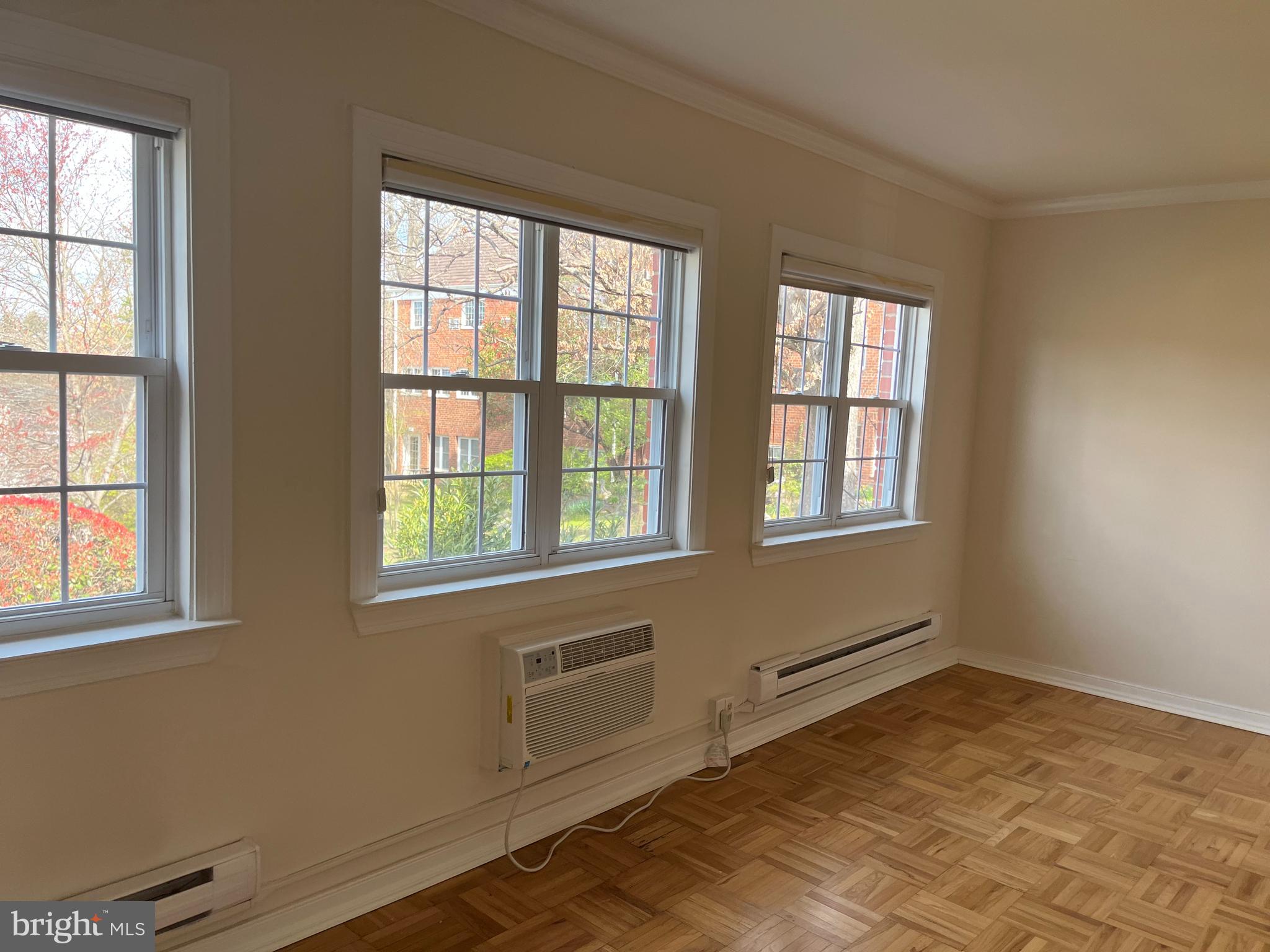 3216 Gunston Road Alexandria, VA 22302 - Photo 5 of 15 a view of an empty room with a window