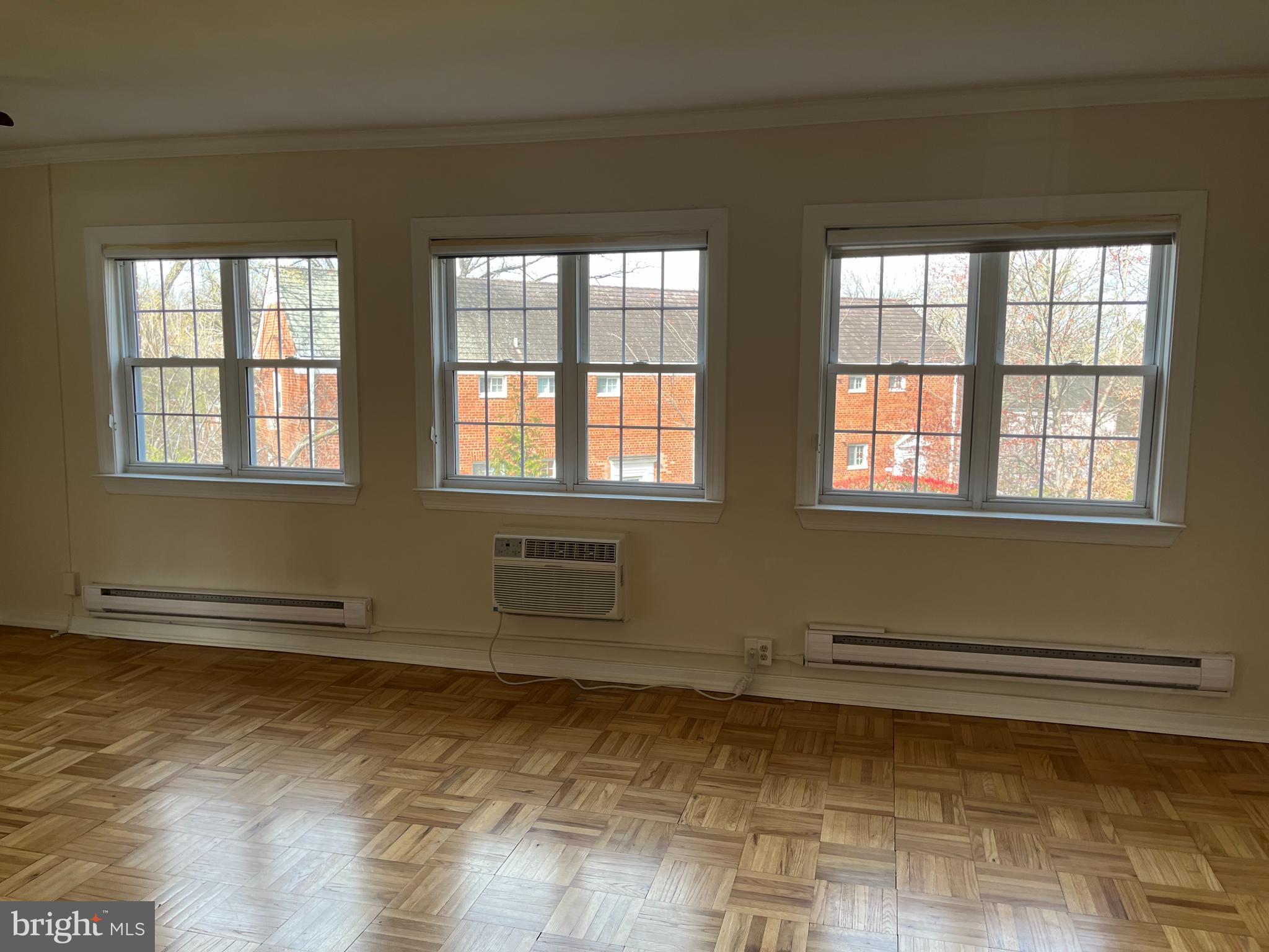 3216 Gunston Road Alexandria, VA 22302 - Photo 9 of 15 a view of an empty room with a window