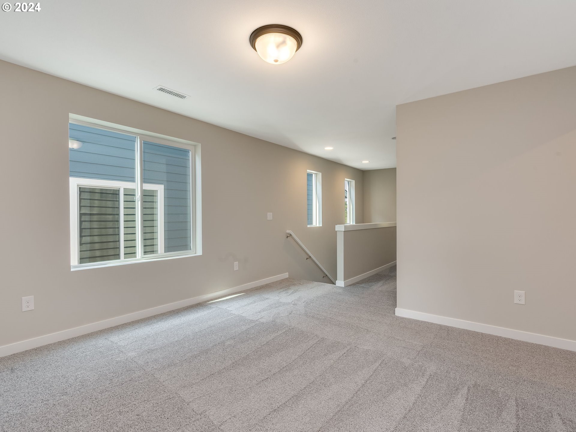 834 Northwest 178th Street Ridgefield, WA 98642 - Photo 23 of 36 an empty room with windows