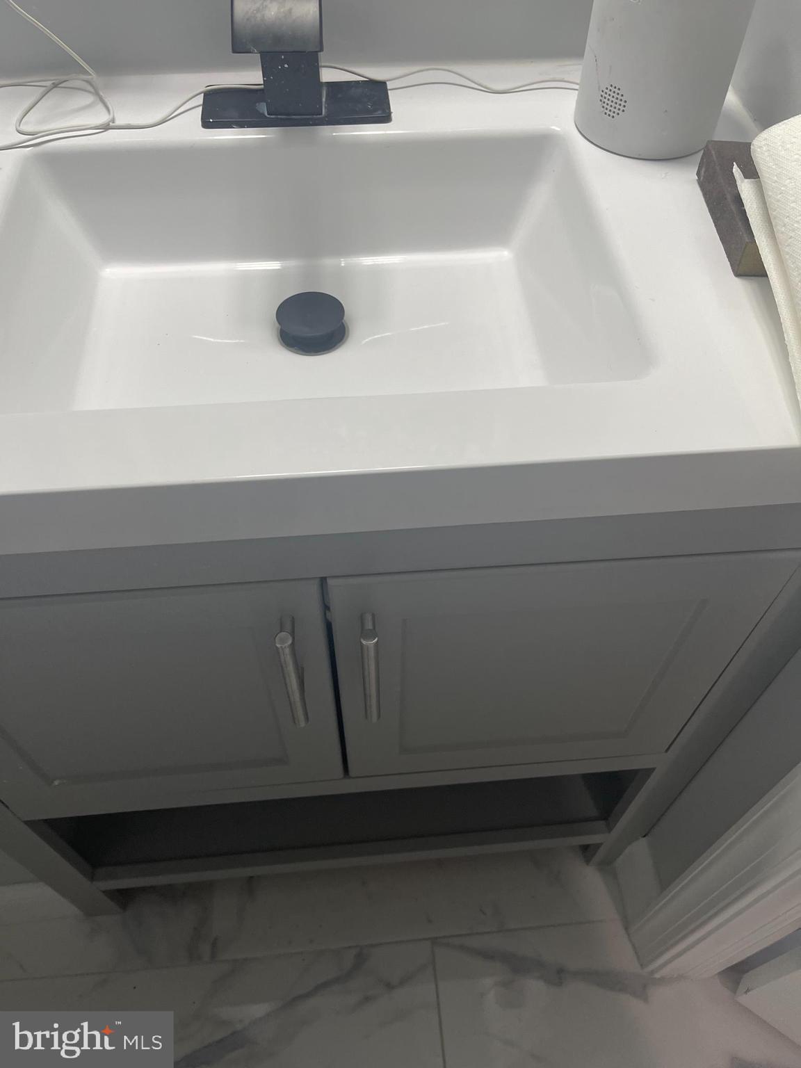 2806 Riggs Avenue Baltimore, MD 21216 - Photo 12 of 23 Sink in powder room
