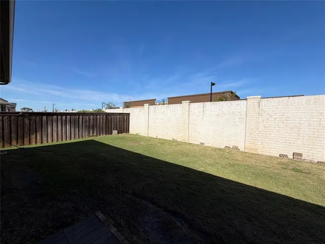 a view of outdoor space and yard