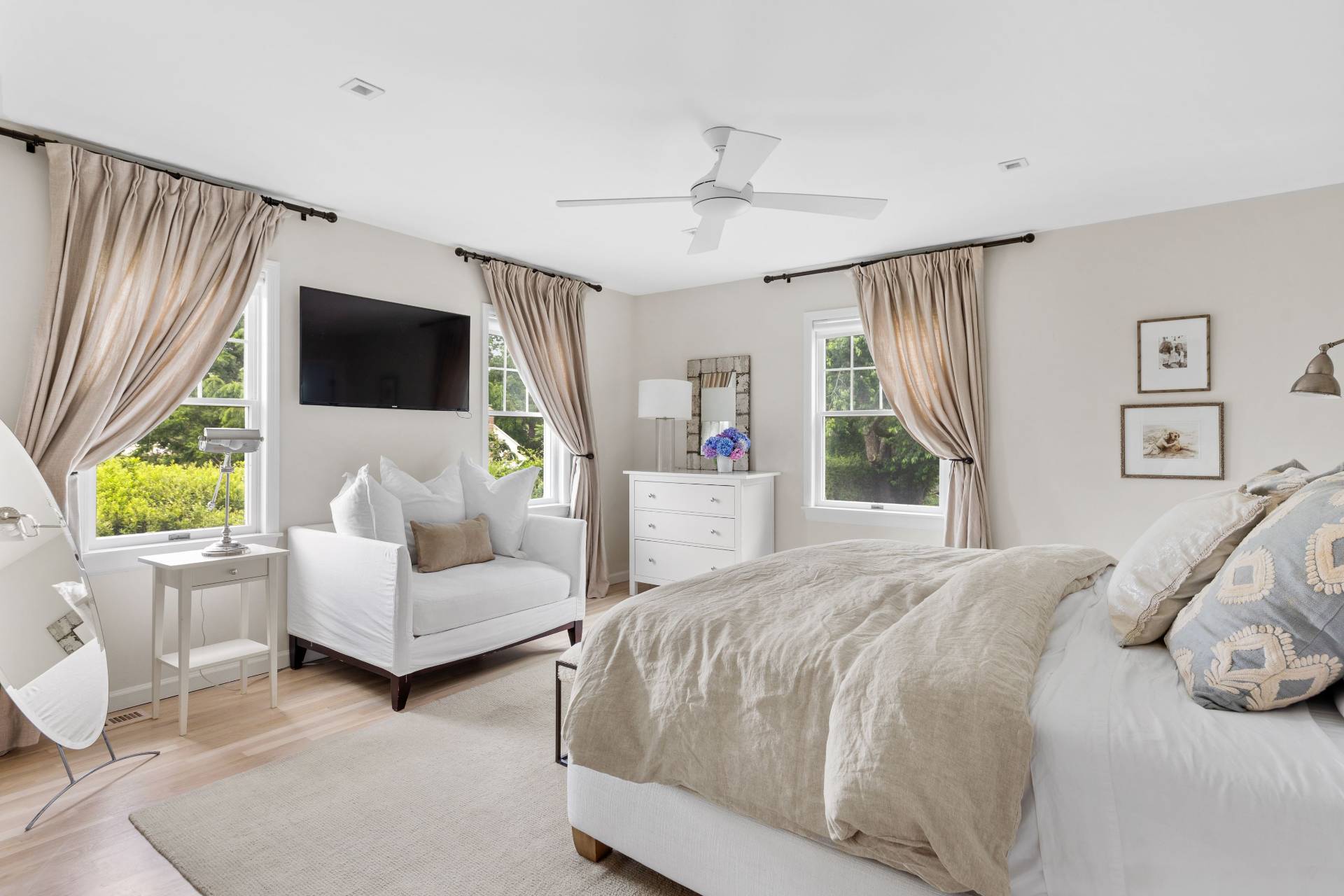 124 Ocean Road Bridgehampton, NY 11932 - Photo 14 of 27 a bedroom with a bed and a couch