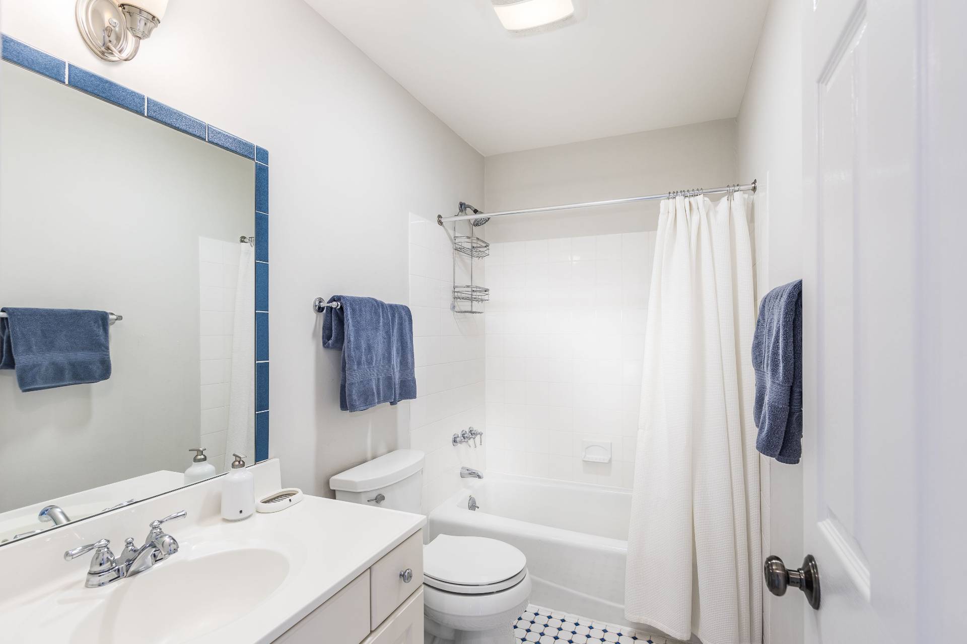 124 Ocean Road Bridgehampton, NY 11932 - Photo 19 of 27 a bathroom with a sink toilet and shower