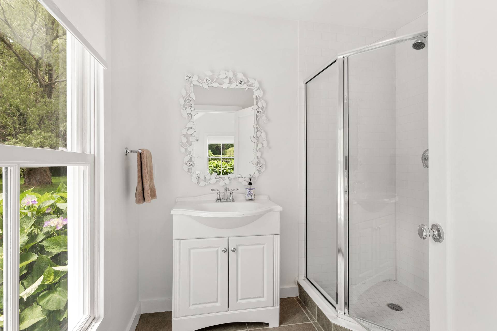 124 Ocean Road Bridgehampton, NY 11932 - Photo 25 of 27 a bathroom with a shower a sink and mirror