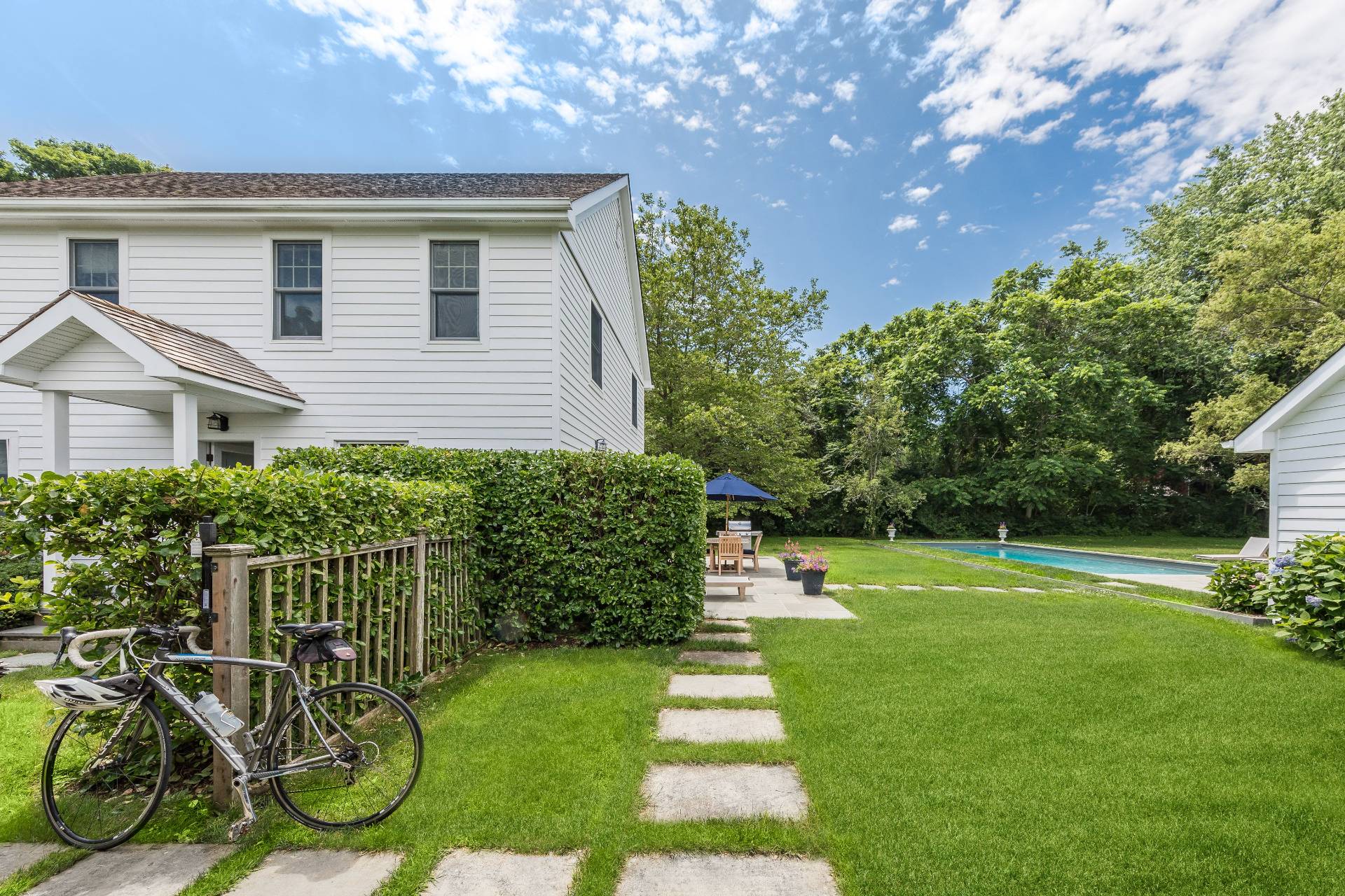 124 Ocean Road Bridgehampton, NY 11932 - Photo 4 of 27 a view of a porch with chairs and plants