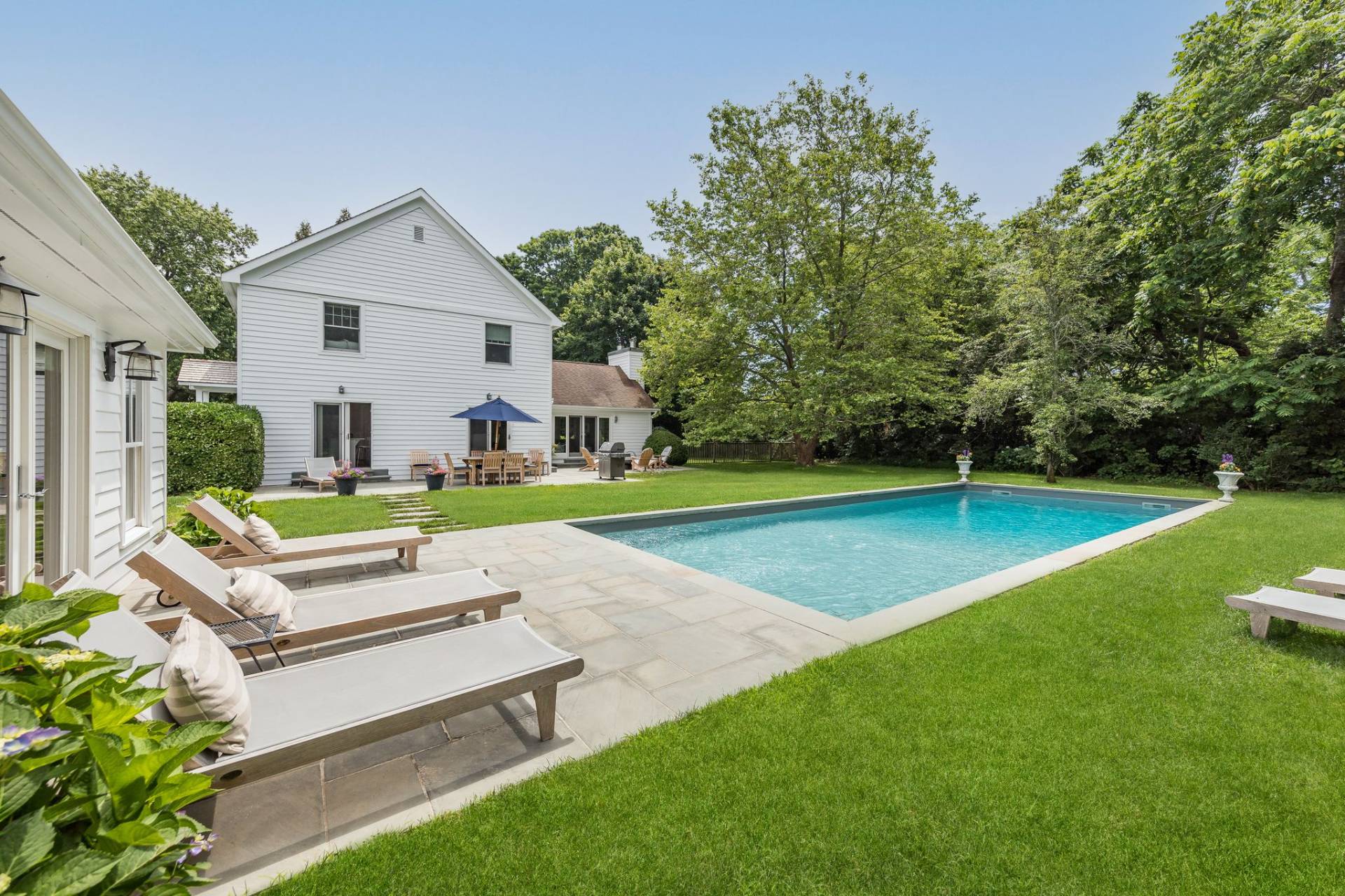 124 Ocean Road Bridgehampton, NY 11932 - Photo 5 of 27 a view of a house with a yard and sitting area