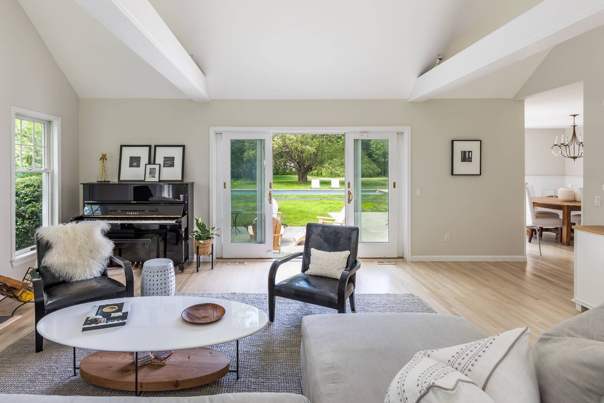 124 Ocean Road Bridgehampton, NY 11932 - Photo 9 of 27 a living room with furniture and a large window