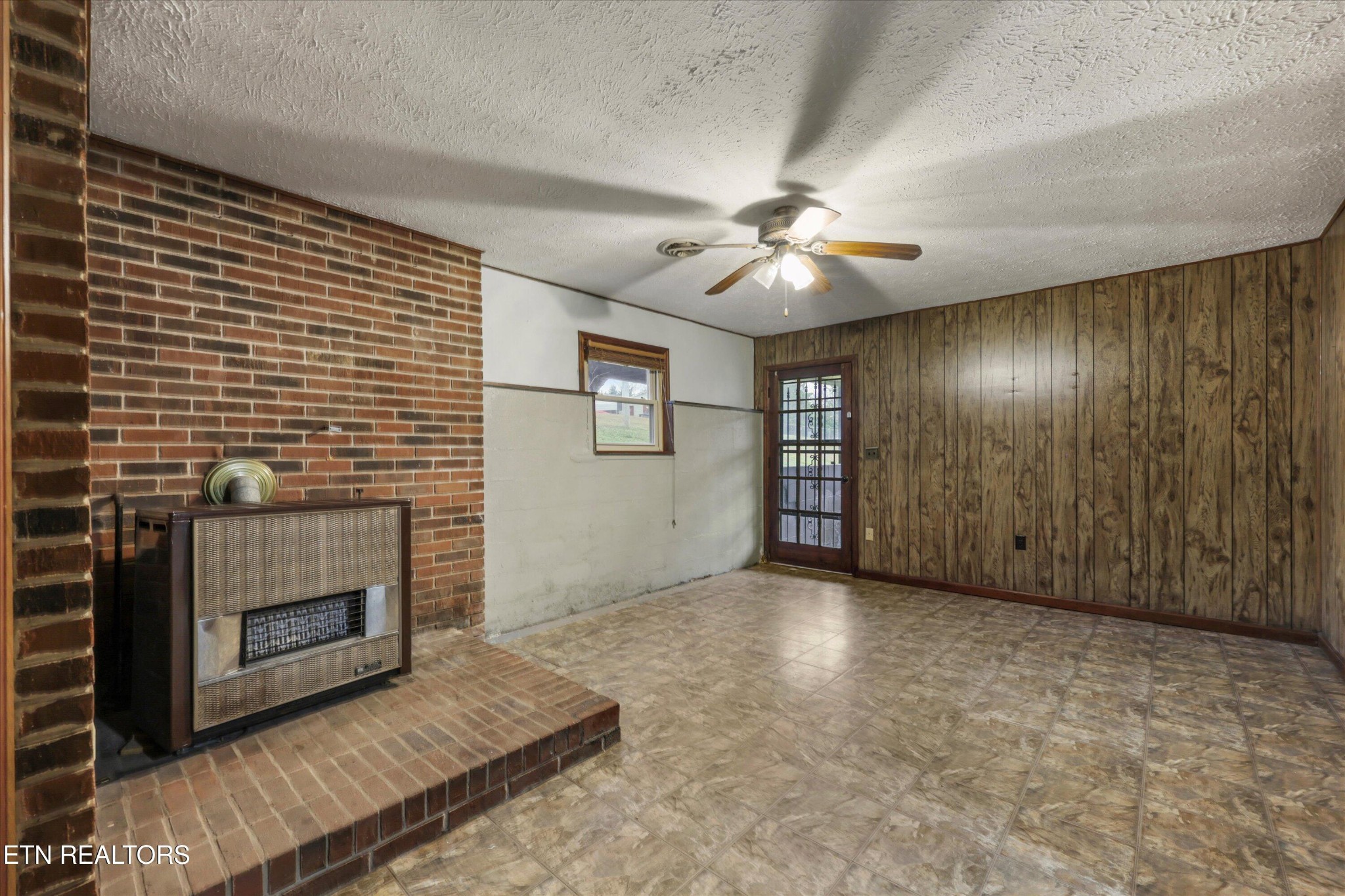 47 Paint Rock Ferry Road Kingston, TN 37763 - Photo 22 of 38 a view of an empty room with a fireplace