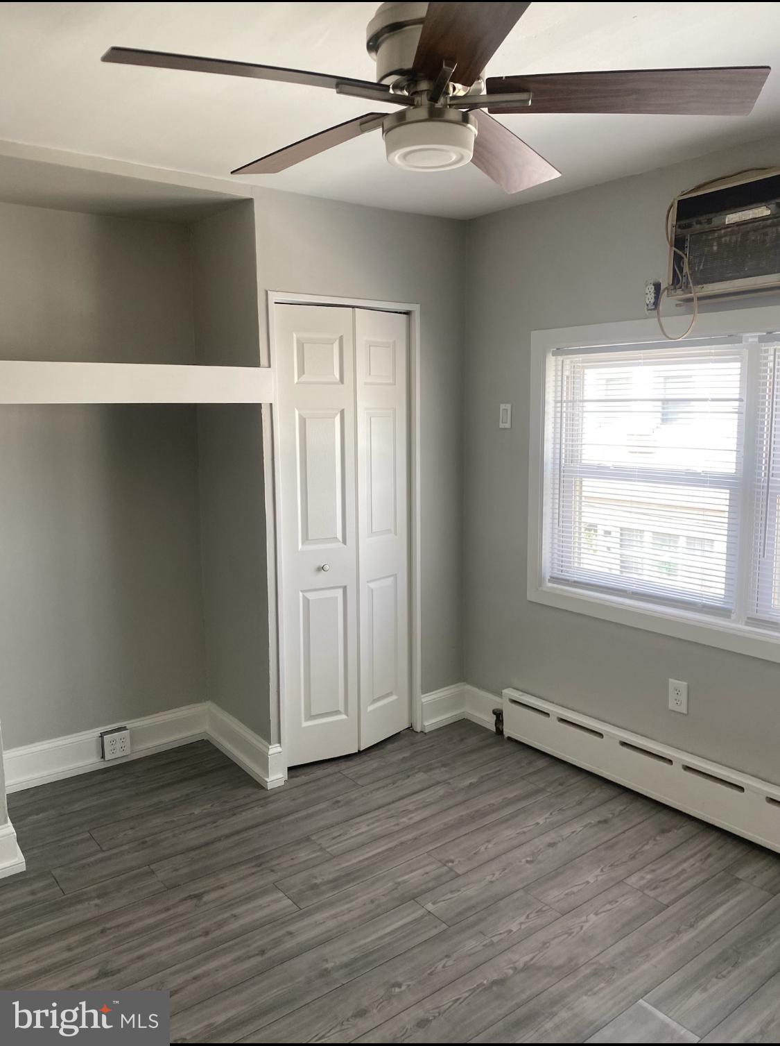 1738 Stocker Street Philadelphia, PA 19145 - Photo 4 of 8 wooden floor in an empty room