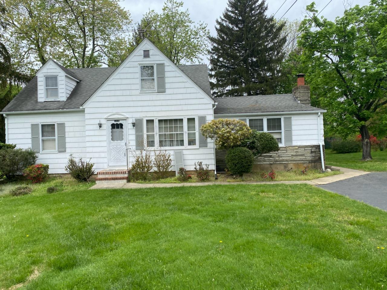 156 Waterworks Road Freehold, NJ 07728 - Photo 1 of 1 a view of a house with a yard and a garden