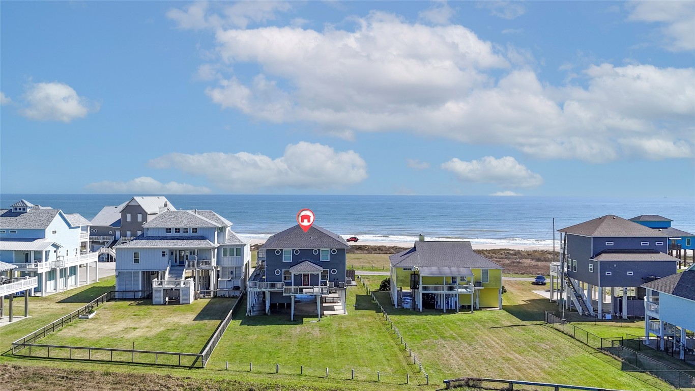 3433 Sand Castle Lane Crystal Beach, TX 77650 - Photo 2 of 30 a view of houses with yard