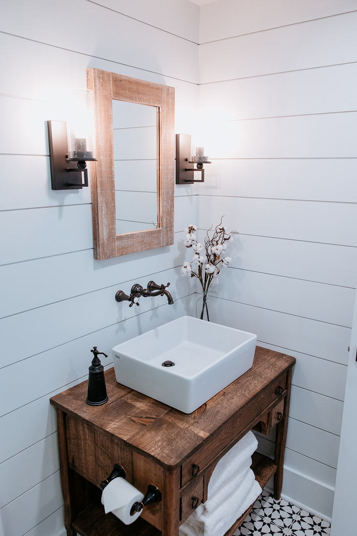 281 North Snipehollow Road Elizabeth, IL 61028 - Photo 33 of 68 a bathroom with a sink and a mirror