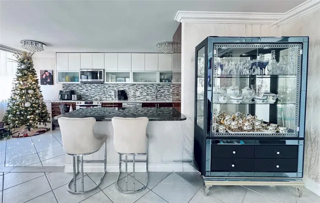 a room with a table and chairs