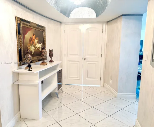a bathroom with a sink vanity and a mirror