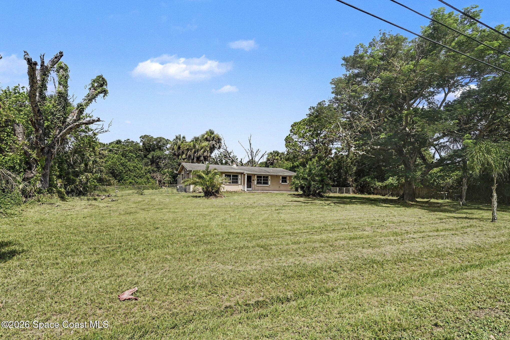 1406 Northeast Tropicana Road Palm Bay, FL 32905 - Photo 3 of 37 Front