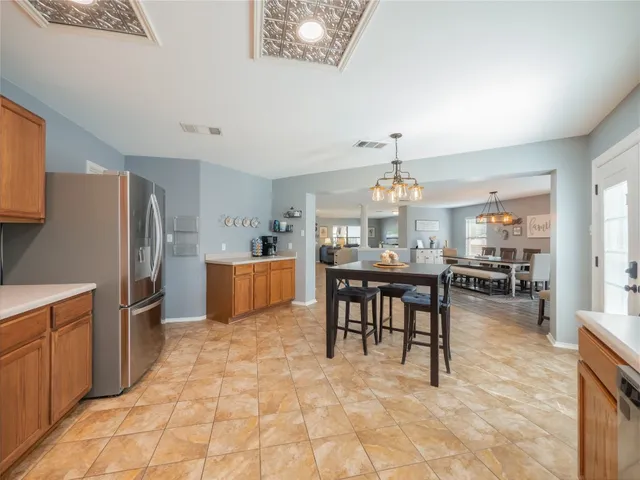 a view of a dining room kitchen and a window