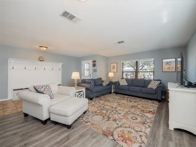 a living room with furniture and a couch