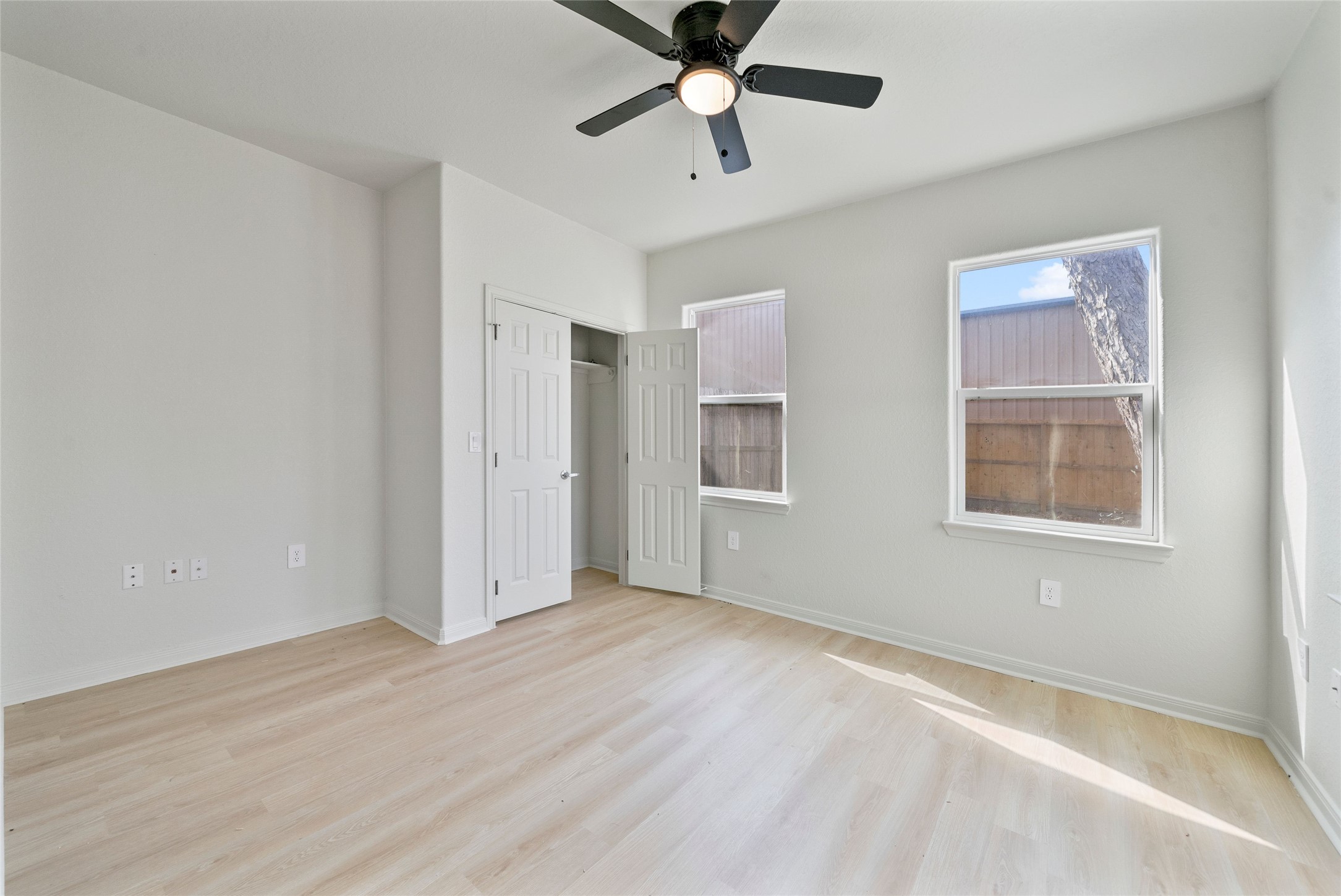 4415 Castor Street Houston, TX 77022 - Photo 16 of 21 a view of empty room with wooden floor and ceiling fan