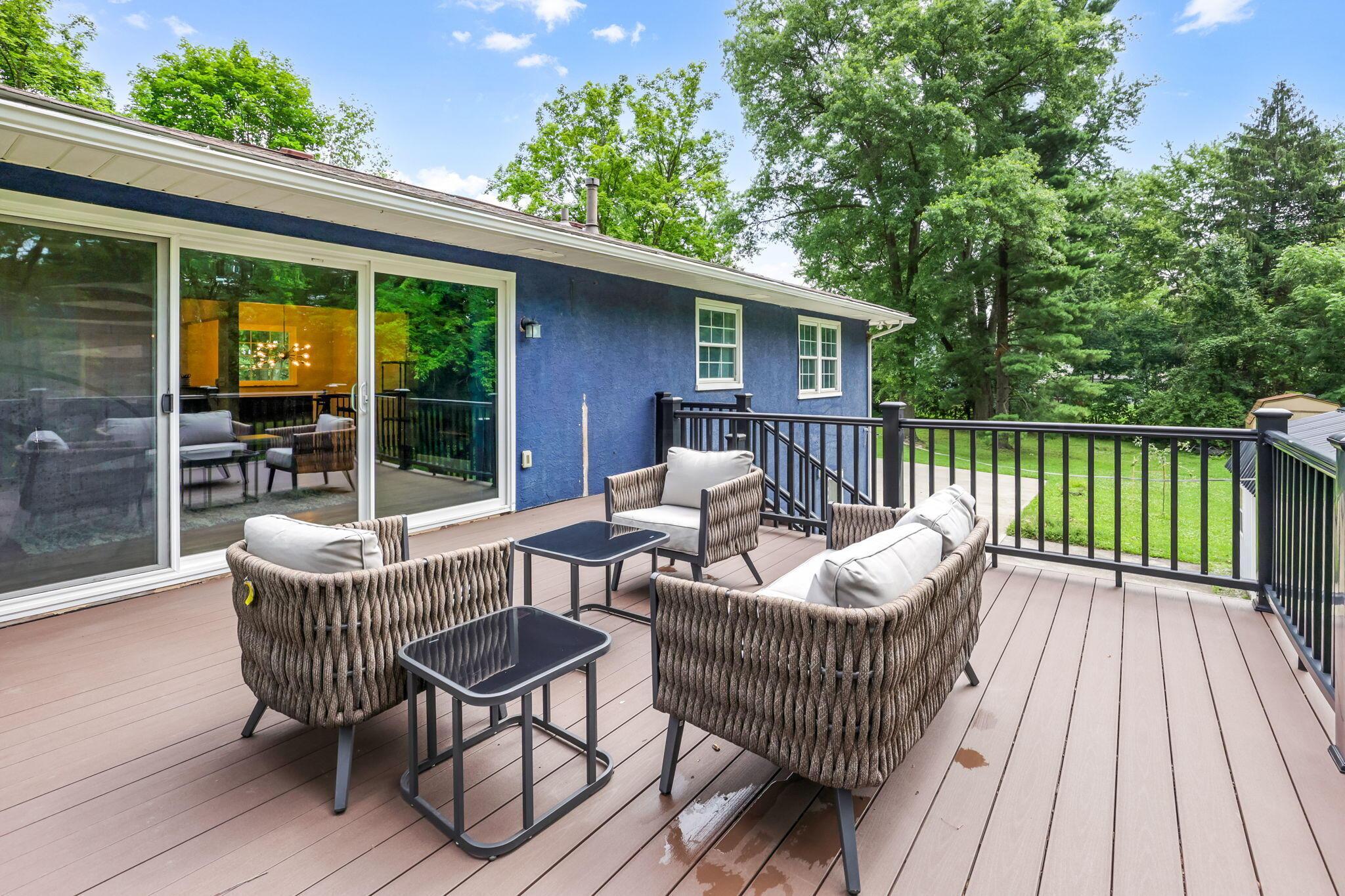 14823 Cleveland Road Southwest Pataskala, OH 43062 - Photo 32 of 57 Expansive outdoor deck featuring wood-finish flooring and black railing