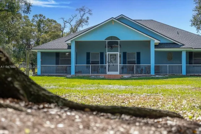 a view of a house with a swimming pool