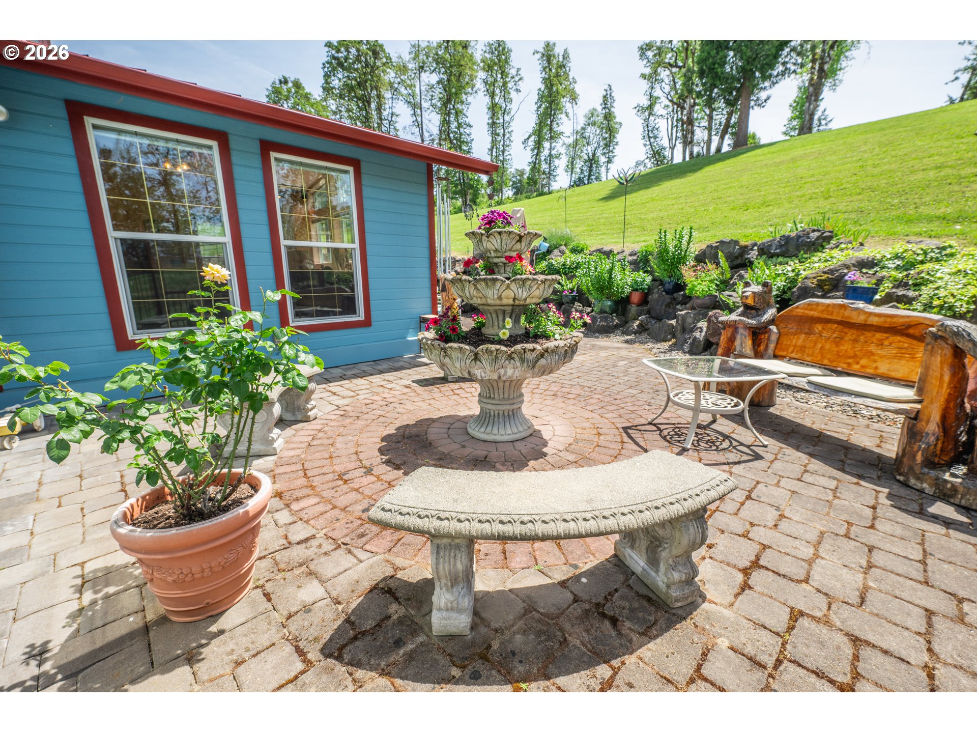 489 Fir Vista Road Sutherlin, OR 97479 - Photo 28 of 47 a view of a patio with table and chairs potted plants