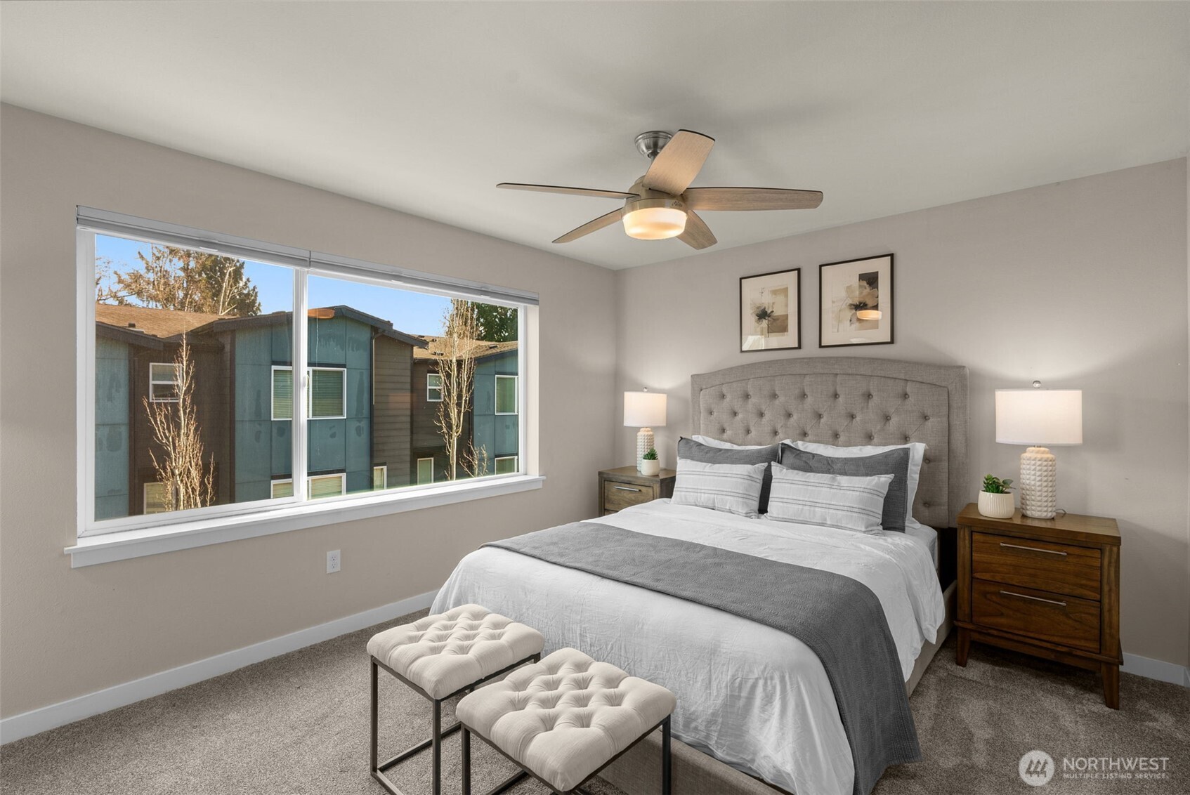 14913 48th Avenue West, Unit K1 Edmonds, WA 98026 - Photo 11 of 31 a bedroom with a large bed and a window