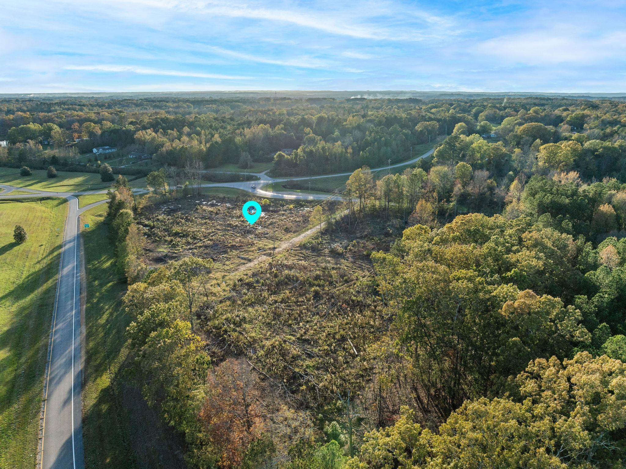 45 S Road Corinth, MS 38834 - Photo 25 of 34 a view of a lake with mountains in the background
