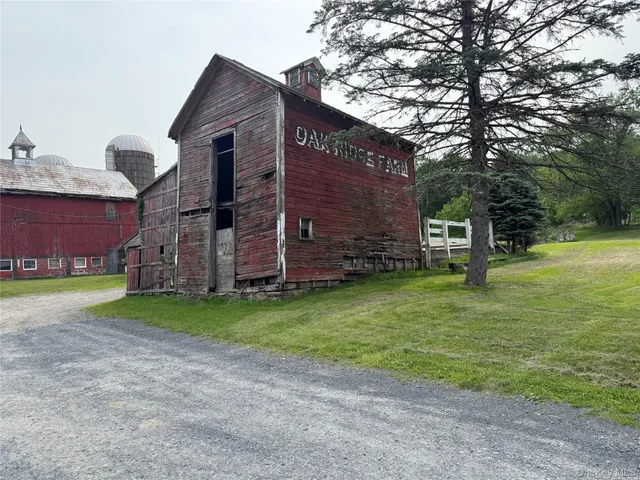a view of a back yard of the house